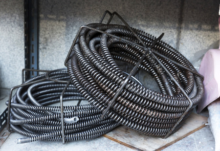 Drain Cleaning cable in storageの写真素材