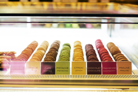 Sweet and colourful french macaroons or macaron in refrigeratorの写真素材