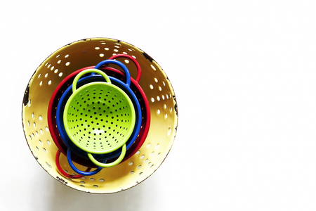 Colorful empty bowls stacked on backgroundの写真素材