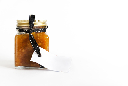 Paper tag on bitter marmalade and contreau jam bottleの写真素材