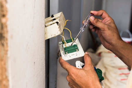 Repairing household power, dismantling faulty wall switch light, changing a light switch.