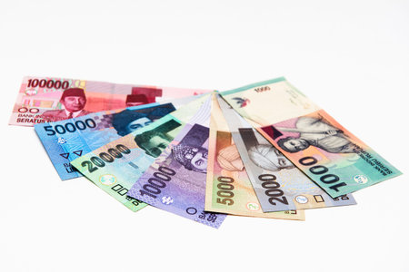 Colorful of Indonesia banknotes stacked on background