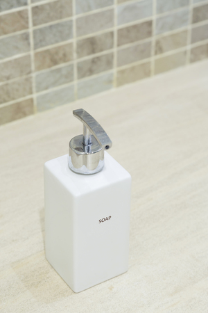 Bottle of liquid soap in bathroomの写真素材