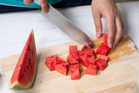 Watermelon cut in cube shape prepared for make juiceの写真素材