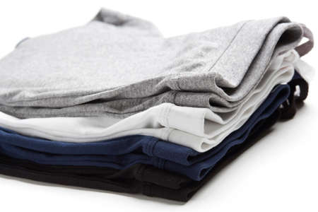 White, grey, blue and black color tank top group on backgroundの写真素材