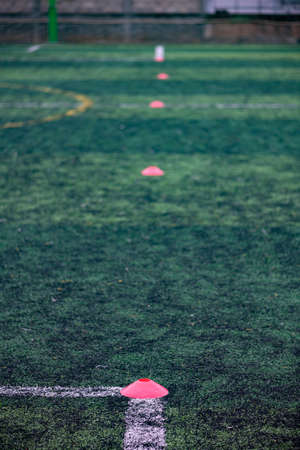 Soccer training equipments on fieldの写真素材