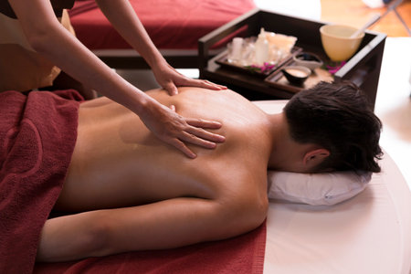 Asian Man Getting Massage In Spaの写真素材
