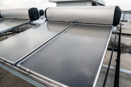 Solar hot water system on rooftopの写真素材