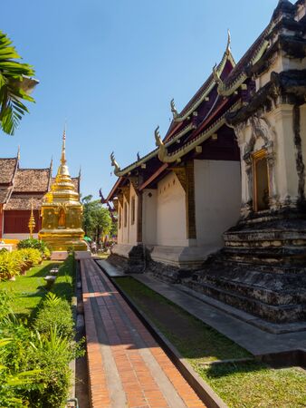 WAT PHRA SINGH TEMPLE CHIANG MAI THAILAND-11 JANUARY 2020:Construction of Wat Phra Singh, B.E. Year 1345, when King Payu, the fifth king of the Mangrai Dynasty Pagoda built for Father Kham Khu Foo.のeditorial素材