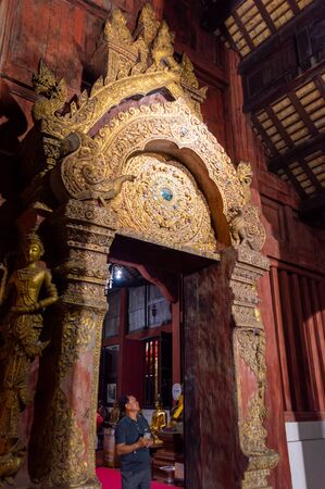 WAT PHRA SINGH TEMPLE CHIANG MAI THAILAND-11 JANUARY 2020:Construction of Wat Phra Singh, B.E. Year 1345, when King Payu, the fifth king of the Mangrai Dynasty Pagoda built for Father Kham Khu Foo.のeditorial素材