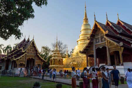 WAT PHRA SINGH TEMPLE CHIANG MAI THAILAND-11 JANUARY 2020:Construction of Wat Phra Singh, B.E. Year 1345, when King Payu, the fifth king of the Mangrai Dynasty Pagoda built for Father Kham Khu Foo.のeditorial素材