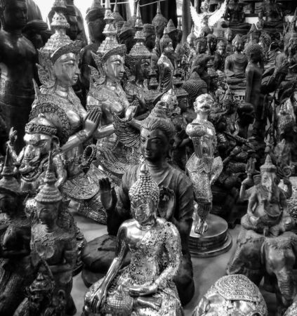 Various statues of Buddha in black and white.の写真素材