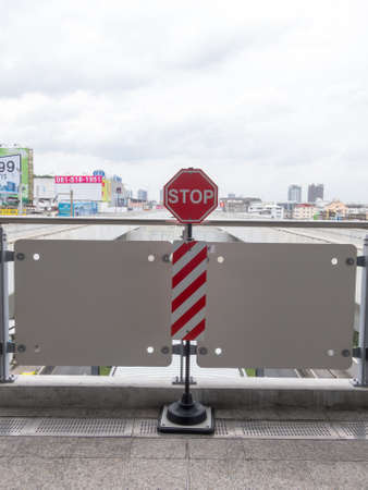 On the BTS station BANGKOK,THAILAND-17 AUGUST 2018: A train at the station opens the door waiting for passengers. on,17 AUGUST 2018, in Thailand.のeditorial素材