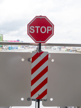 On the BTS station BANGKOK,THAILAND-17 AUGUST 2018: Red lettering stop sign on,17 AUGUST 2018, in Thailand.のeditorial素材