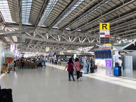 Suvarnabhumi BANGKOK THAILAND-31 OCTOBER 2018;In the airport, passengers are walking to different...