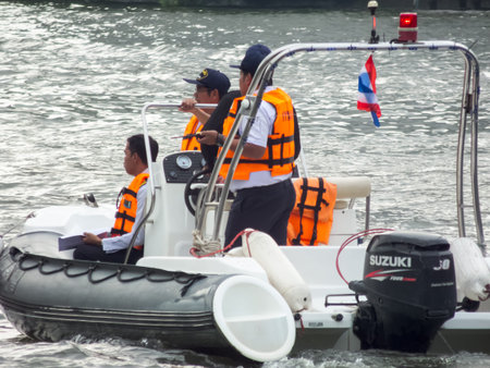 Chao Phraya River  BANGKOK THAILAND-31 DECEMBER 2018:The security guard is taking care of the safety...
