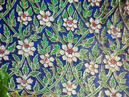 Antique flower designs from old tiles made of decorative patterns in ancient buildings.の写真素材