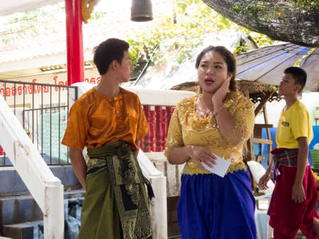 Folk singer in Wat Sala Loi Temple  Nakhon Ratchasima Thailand  July 21-Folk singers are singing the hymns to the hired. This folk song is called Korat song.on July 21 2018のeditorial素材