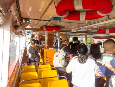 In the passenger boat BANGKOK,THAILAND-01 AUGUST 2018: Passengers are off the boat. on, 01 AUGUST 2018, in Thailand.のeditorial素材