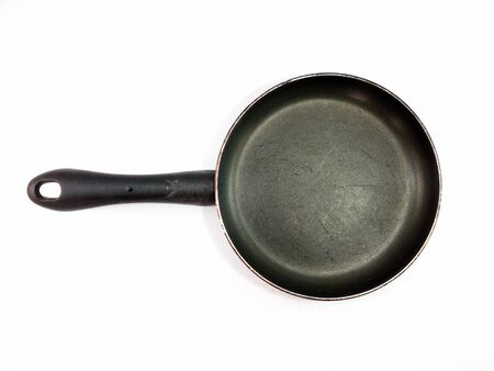 Top black pan on a white background.の写真素材