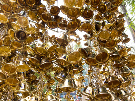 Wat Sala Loi Temple in Nakhon Ratchasima July 21: The silver and gold bells that people bought merit...