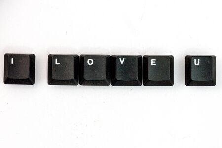 I love U blackkeyboards botton on the White background.の写真素材