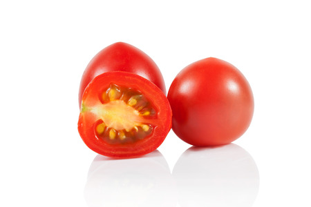 Fresh tomatos on whiteの写真素材