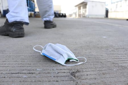 Nose mask fell on the roadの写真素材
