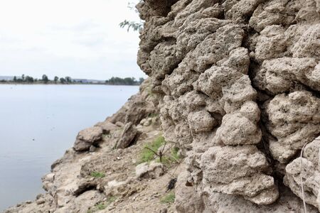 Rocks and dry clay by the river in the summer Chon Buri Thailandの写真素材