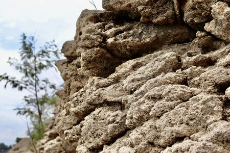 Rocks and dry clay by the river in the summer Chon Buri Thailandの写真素材