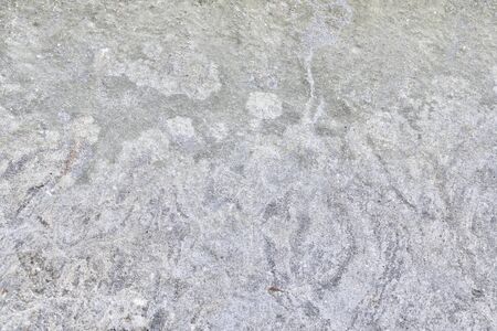 Old Pattern on the stone by the sea at thailandの写真素材
