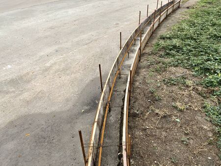 Footpaths are going to be built on the side of the roadの写真素材