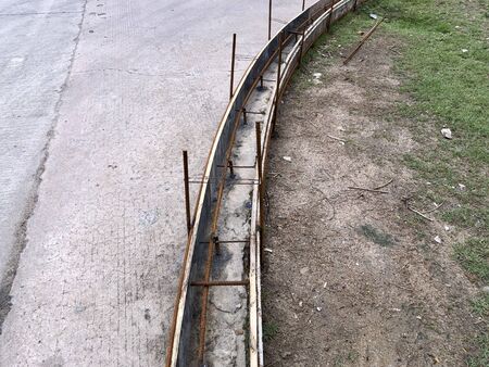 Footpaths are going to be built on the side of the roadの写真素材