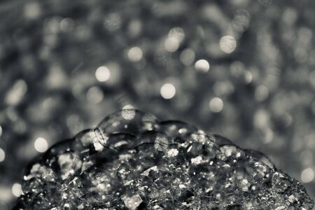 Silver tone bubble and blurred backgroundの写真素材