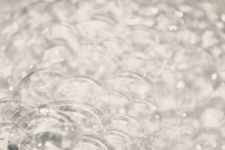 Silver tone bubble and blurred backgroundの写真素材
