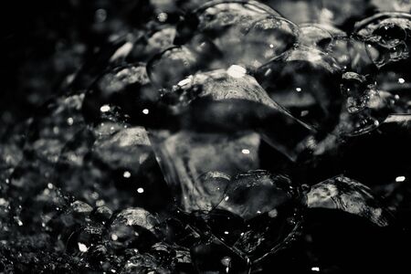 Silver tone bubble and blurred backgroundの写真素材
