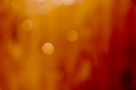 Bokeh images and blur of water droplets on an orange plank