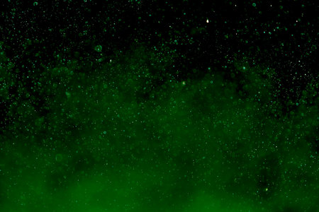 Bokeh images made from water and blurred in green tones