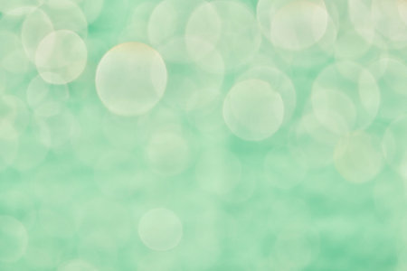 Blurred images and bokeh made from water droplets in green tones