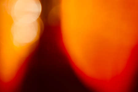 Blurred images and bokeh made from water that is clinging to the surface of the beer bottleの写真素材