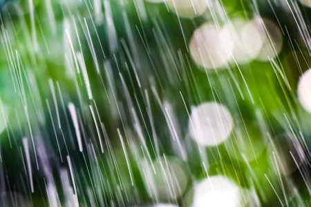 White bokeh in green natural and water drop