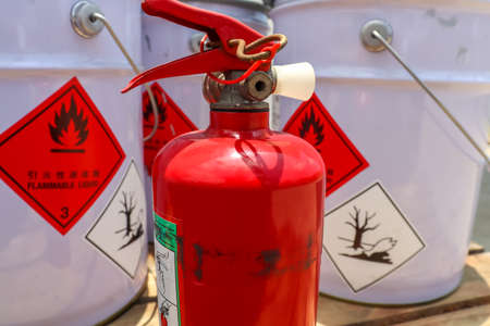 Fire extinguishers and flammable chemicalsの写真素材