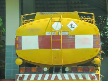Truck yellow and dangerous chemical in industrialの写真素材