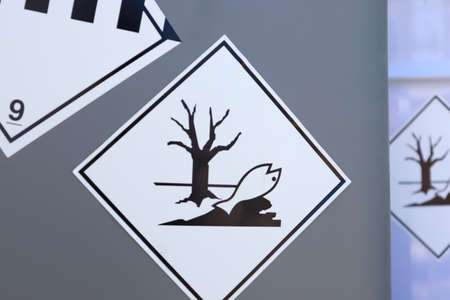 Symbol for corrosive substances on chemical tanksの写真素材