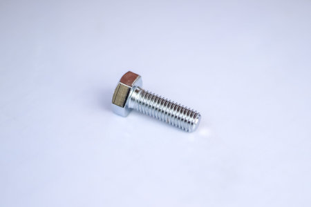 Bolt on a white background industrial maintenance equipment