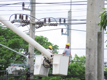 electrician repairing high voltage cable