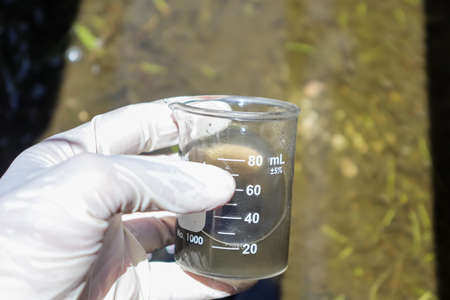 Water samples were collected in industrial canals for inspectionの写真素材