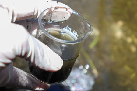 Water samples were collected in industrial canals for inspectionの写真素材