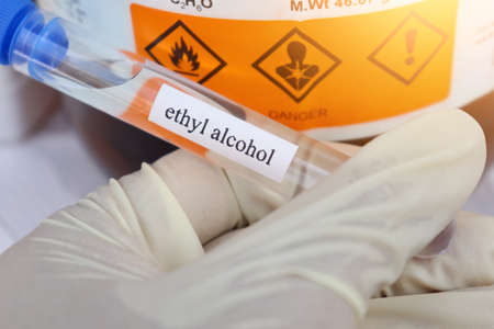 ethyl alcohol in test tube, a chemical used in laboratories or industry and flammableの写真素材