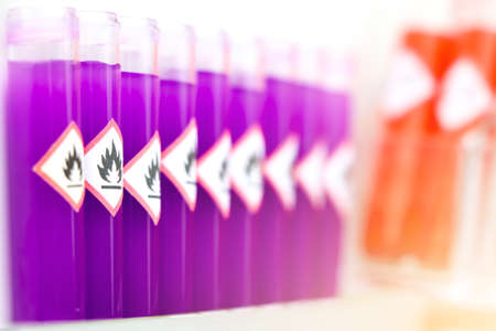 flammable chemicals in test tubes and flammable symbolの写真素材